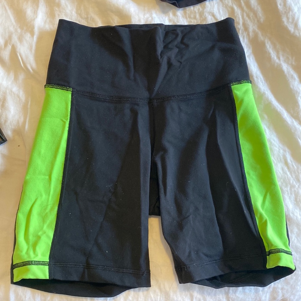 Aritzia bike shorts - black with green/yellow stripes